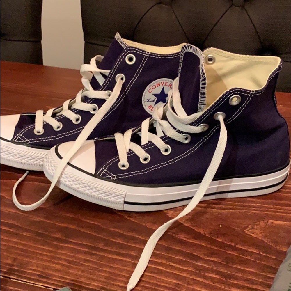 Purple high top converse sneakers